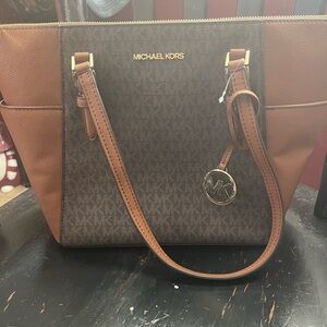 Not for sale. @emily_mehalko
Michael Kors Elegant Brown and Tan Tote